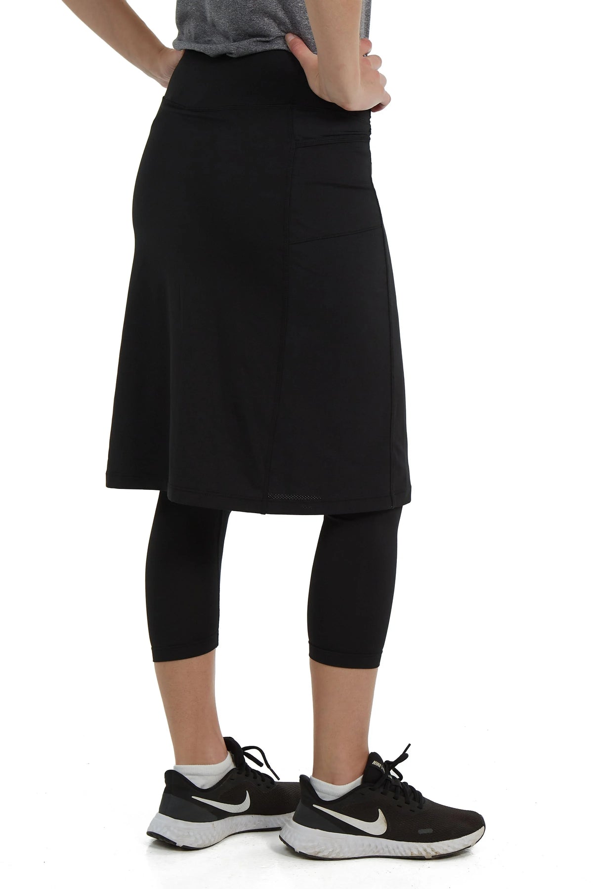 Snoga Athletics black double pocket skirted leggings with modest fit, rear view