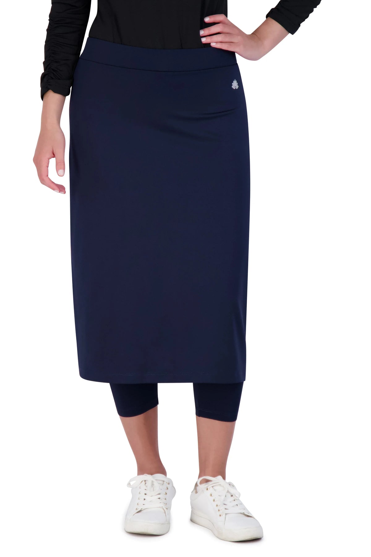Snoga Athletics navy blue modest midi skirt with attached leggings and white sneakers