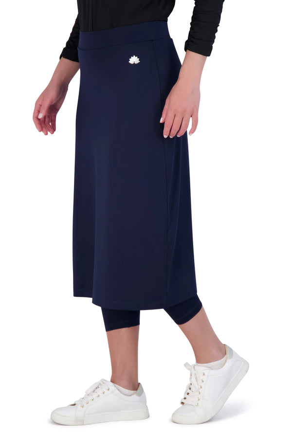 Snoga Athletics navy midi skirt with attached leggings and white lotus logo