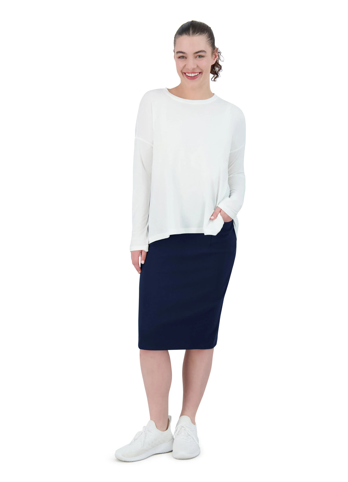 Woman wearing Snoga Athletics navy knee-length pencil skirt and white top, smiling
