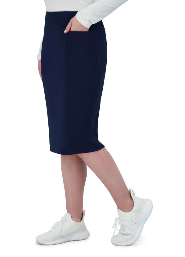 Snoga Athletics navy ribbed knee-length pencil skirt with pockets, paired with white sneakers