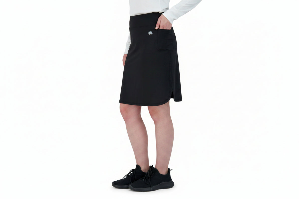 Snoga Athletics black sport pocket skirt with side pocket, worn by woman, activewear style