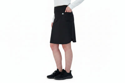Snoga Athletics black sport pocket skirt with side pocket, worn by woman, activewear style