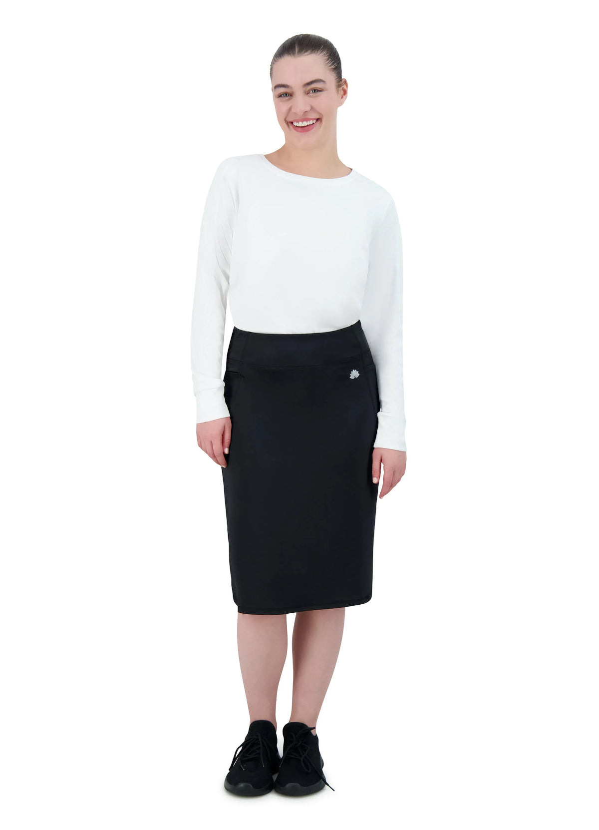 Woman wearing Snoga Athletics black sport pocket fitness skirt with white top