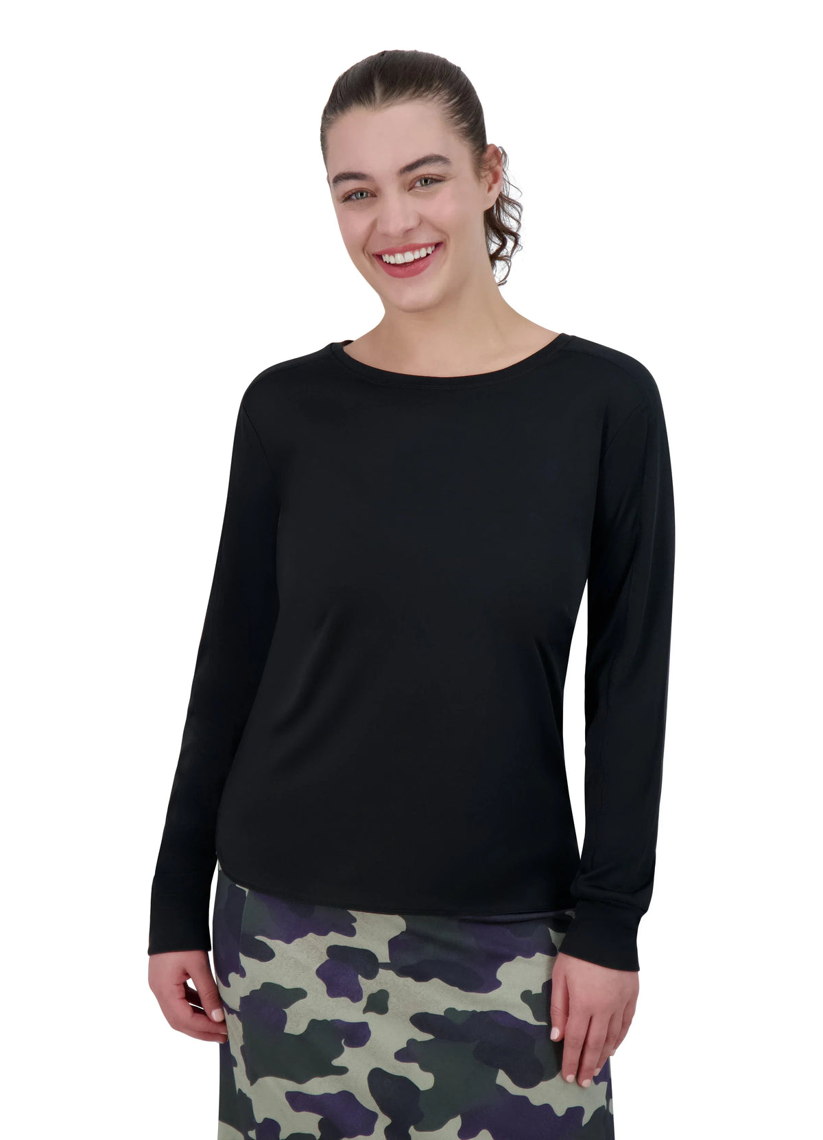 Woman wearing Snoga Athletics black long sleeve active top and camo skirt
