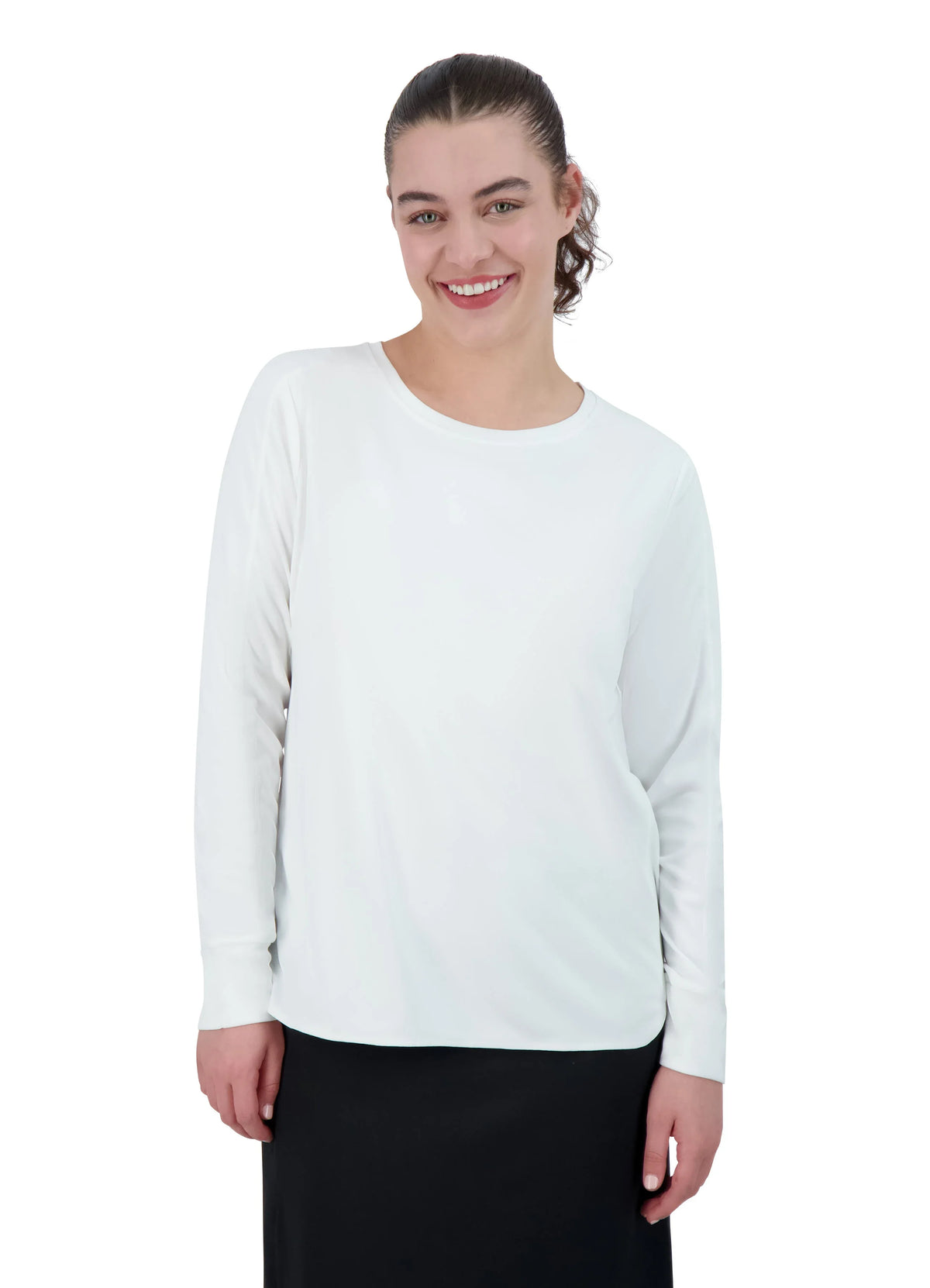 Woman wearing white long sleeve active top and black skirt from Snoga Athletics