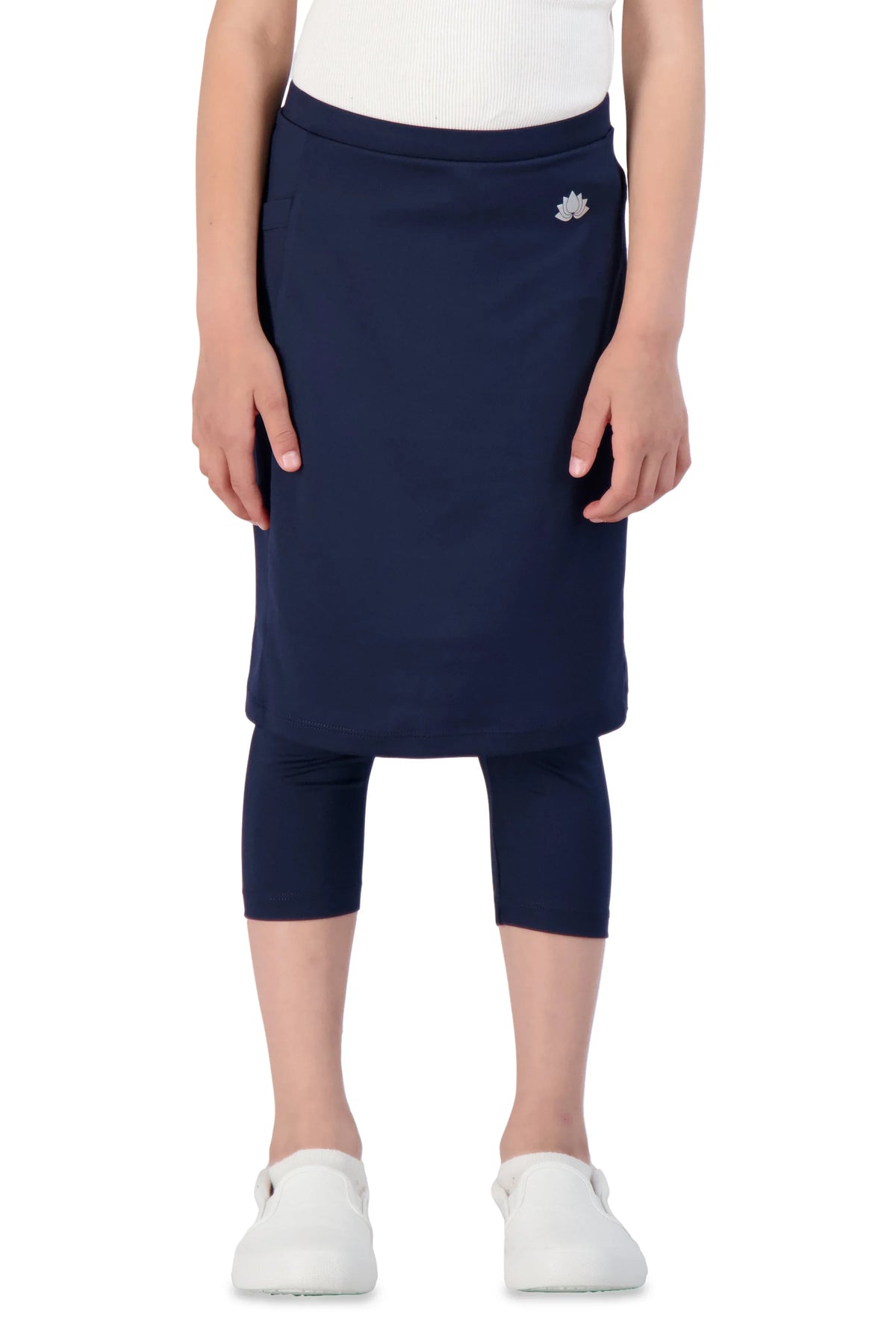 Girl wearing Snoga Athletics navy skirted leggings with pocket and logo